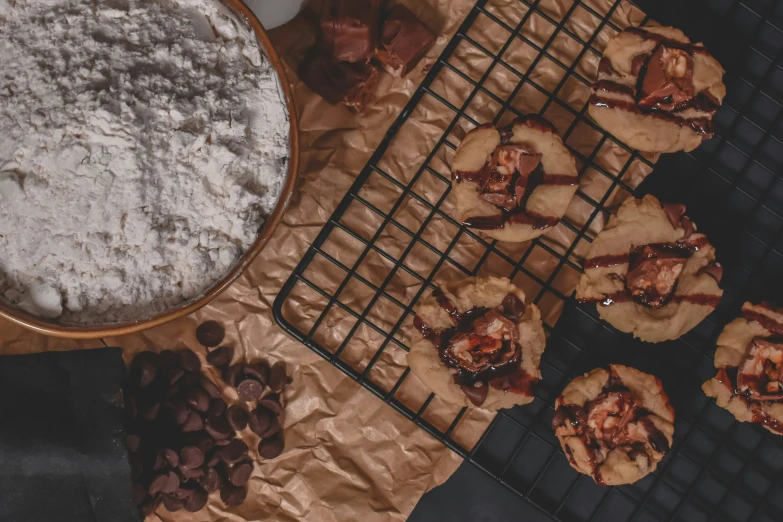 some cookies and bowls on top of a table