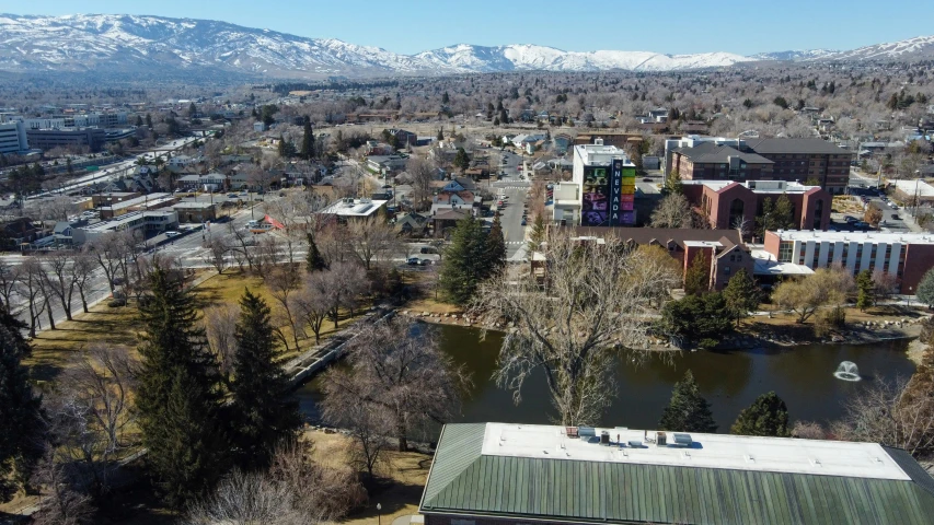 a city with mountains in the distance