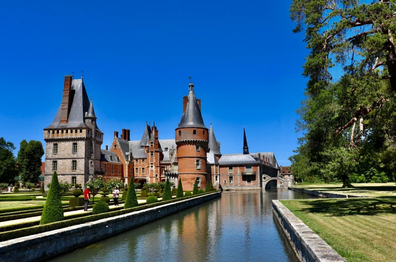 a large castle with towers that look like they're in a fairy tale