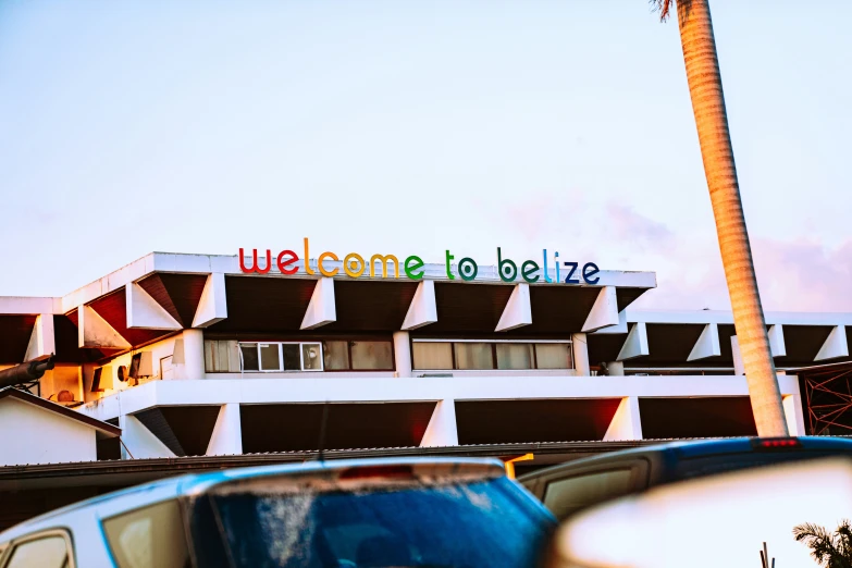 the welcome to holoki sign has been painted in rainbow colors