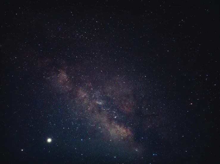 a very dark blue night sky with stars