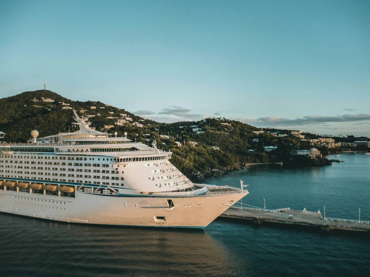 an aerial view of a cruise ship in a harbor