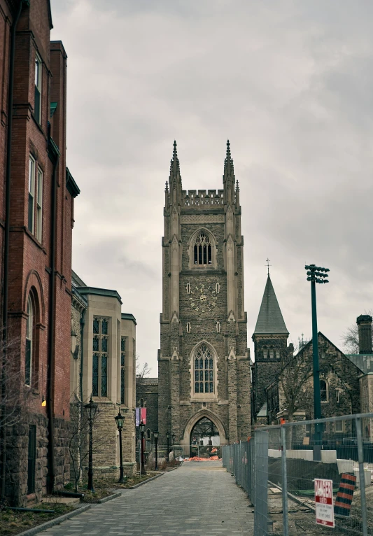 the cathedral has many windows on it and a tall tower