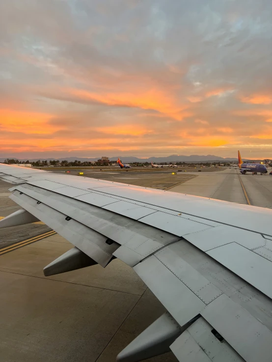 an image of an airplane wing in the air