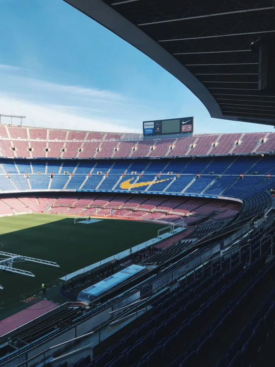 an inside view of the soccer stadium during a sunny day