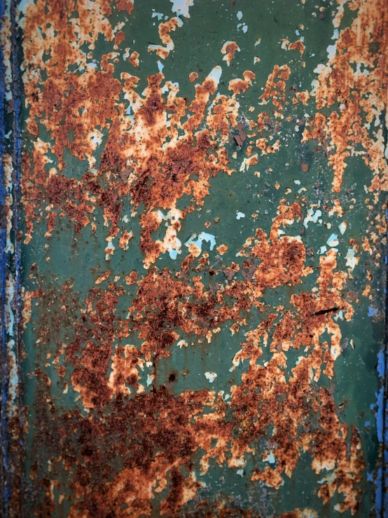 rusted paint on the surface of a metal object