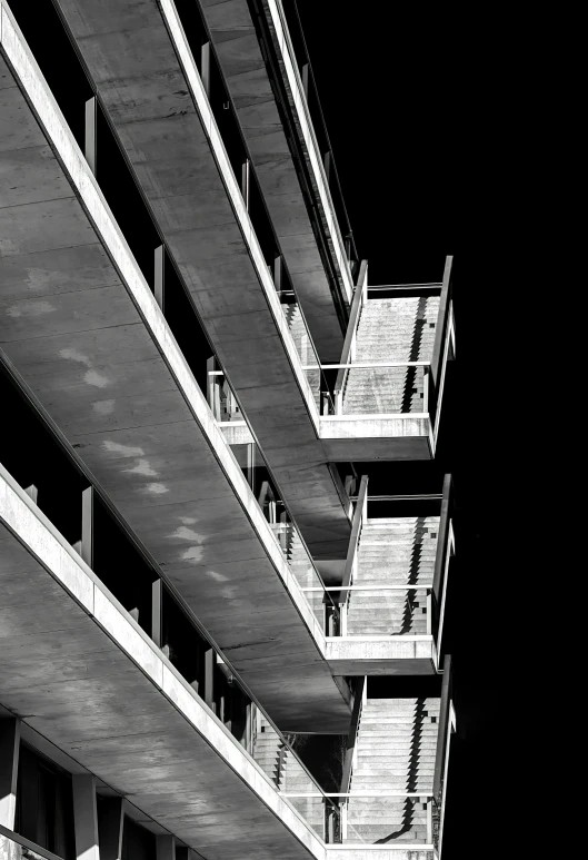 black and white po of building and staircase