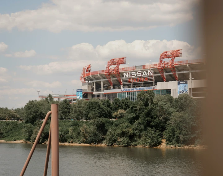 a baseball field sits on the bank of a river