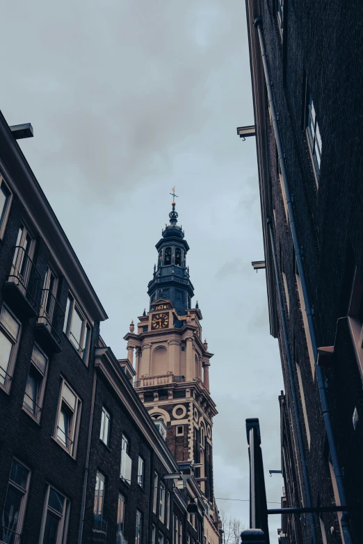 tall building with a dome and two clock towers