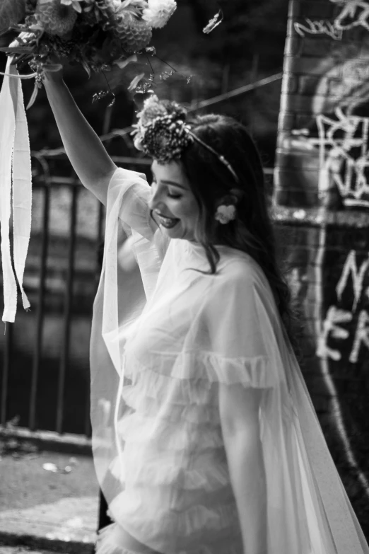 woman in a veil and with flowers