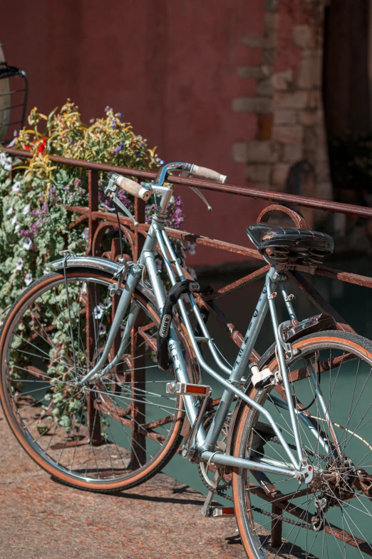 two bikes sitting next to each other outside