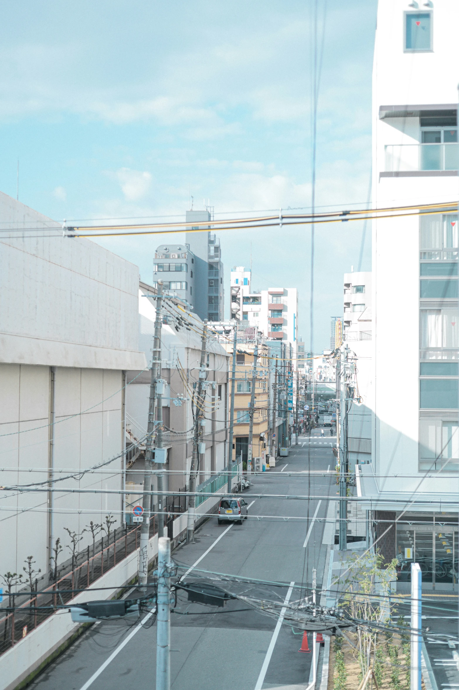 a street that is very wide on a sunny day