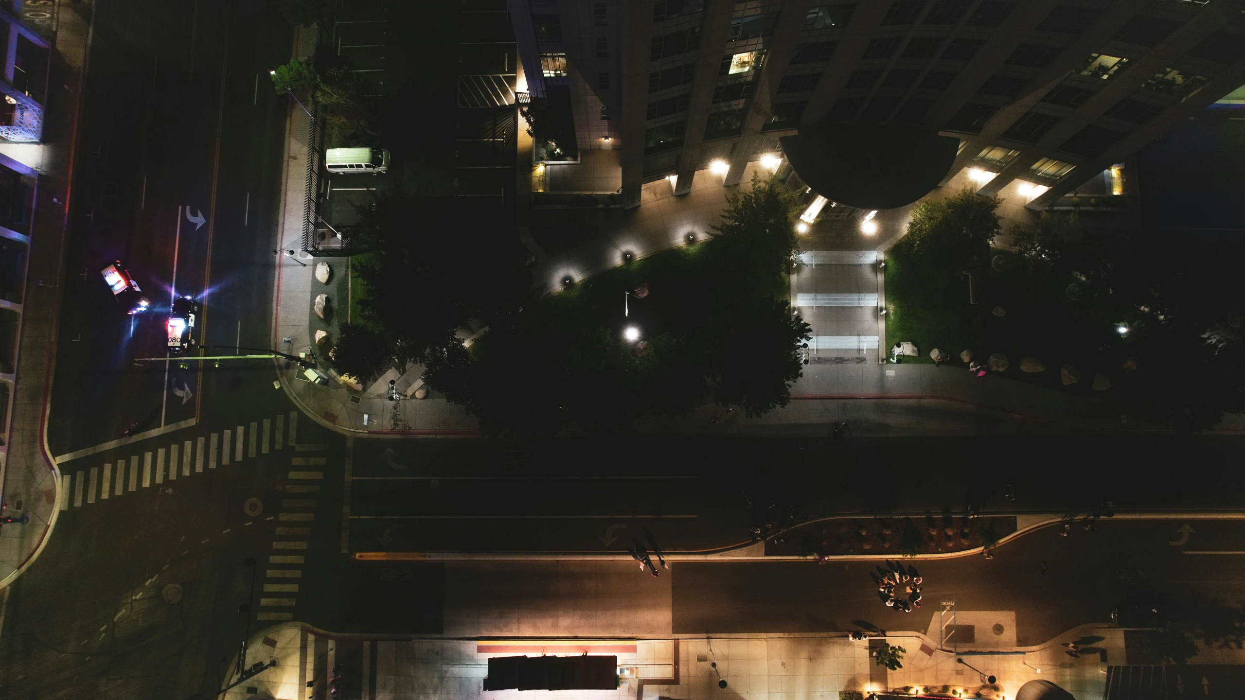 overhead s of a parking garage, street lights and car