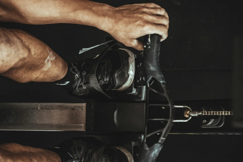 an athlete doing crossfit exercises with dumbbell curls