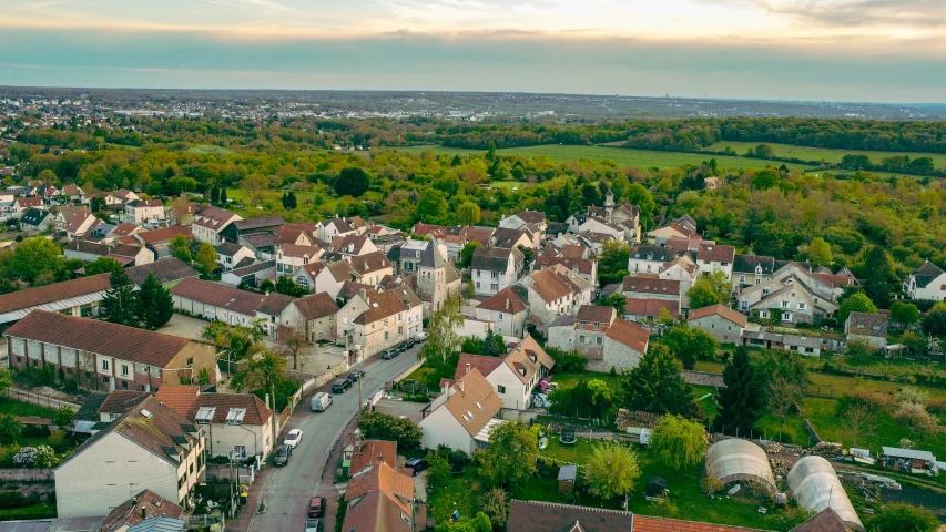 an aerial view of a town with lots of buildings