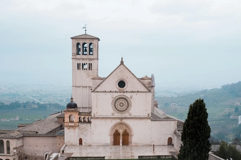 a large cathedral with a clock and tower