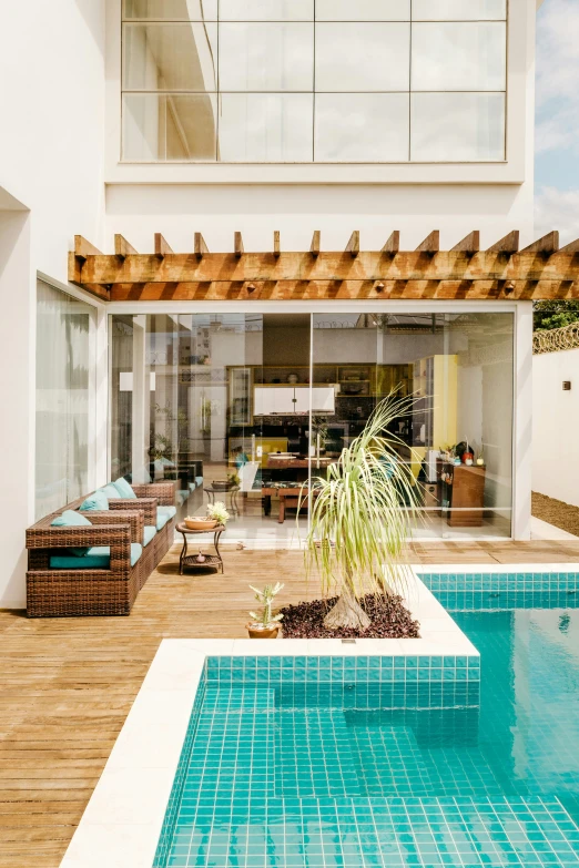 a view of a pool outside an outside house