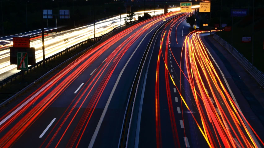 city traffic on interstate 35 at night with long exposure blur