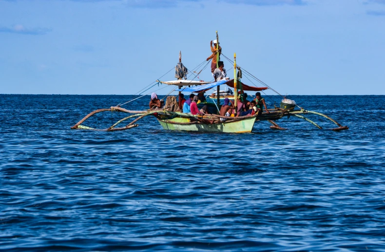 a boat that is floating in the ocean