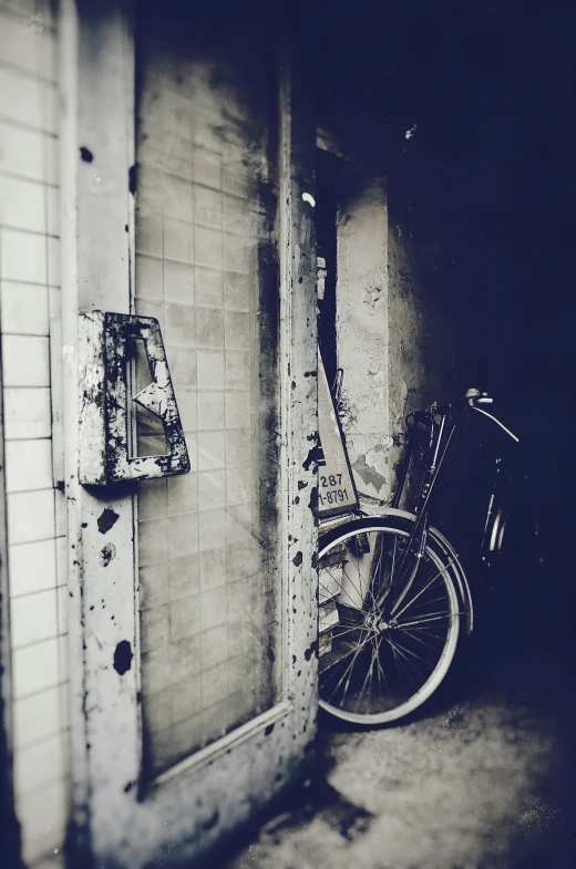 a black and white po of an old bicycle