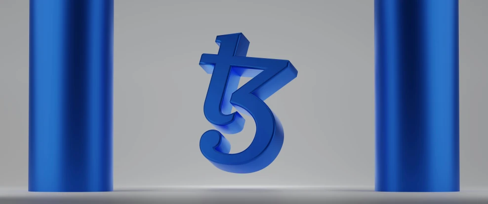 a shiny blue object with the letter j