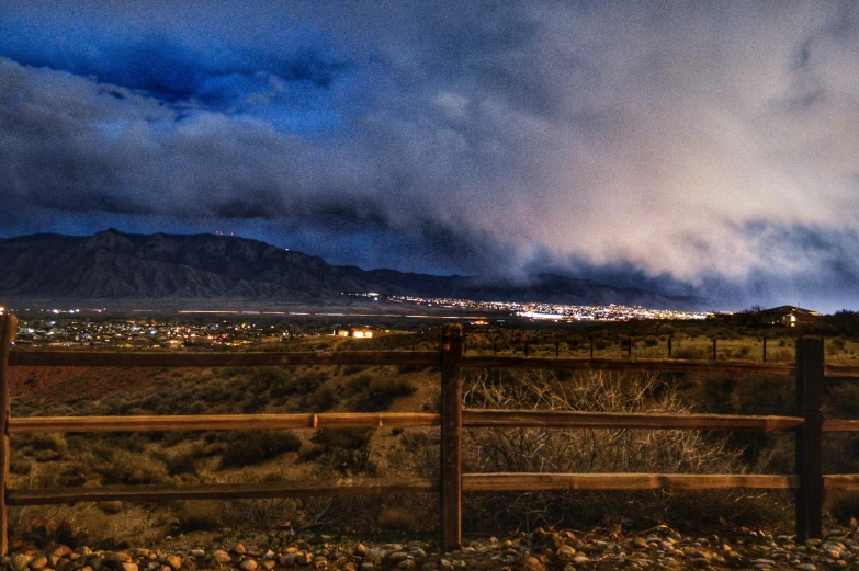 some sort of stormy day in the mountains with clouds