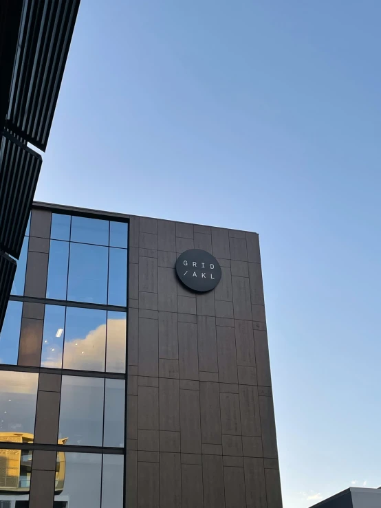 a building with a circular clock on the side