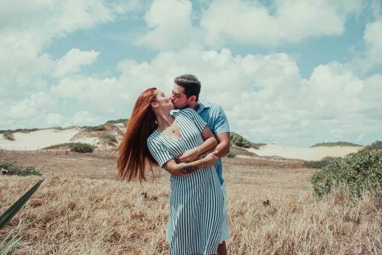 a man and woman standing next to each other