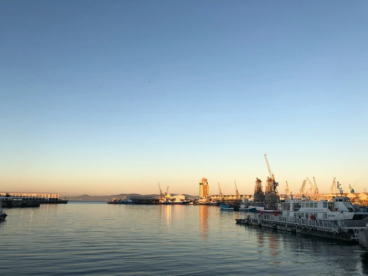 a marina filled with lots of boats in the water