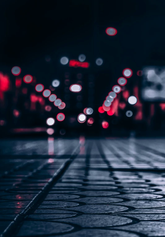 some traffic lights and a street in the dark