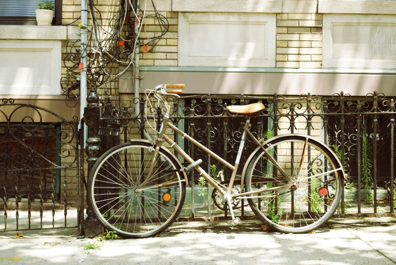 a bike that is next to a fence