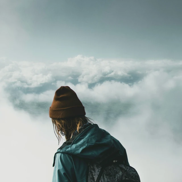 a person looking at the clouds under them