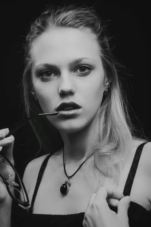 a girl posing in black and white for her po shoot