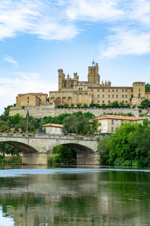 the town sits atop a hill above a river