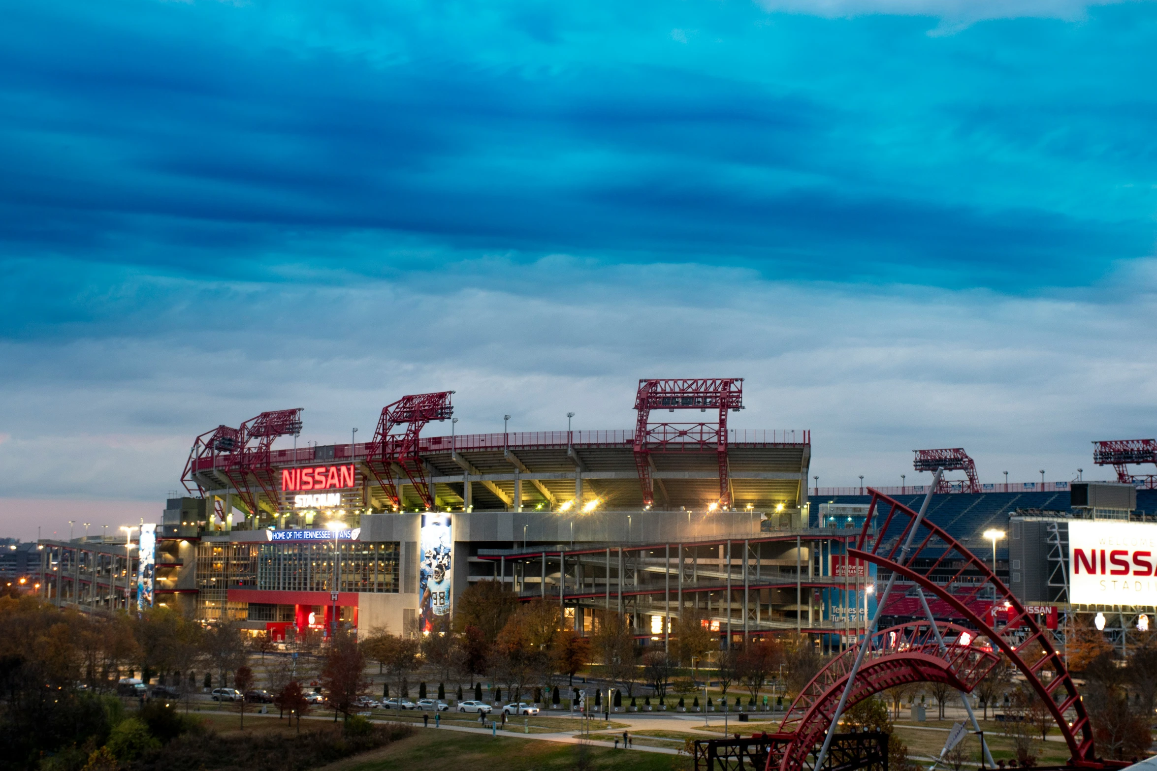 the stadium building and large sign near the stadium