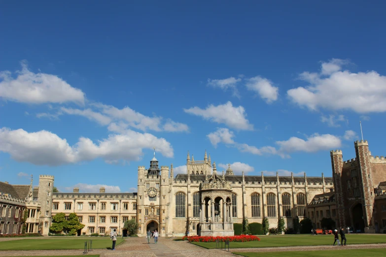 a big building with a tall brick facade on the side