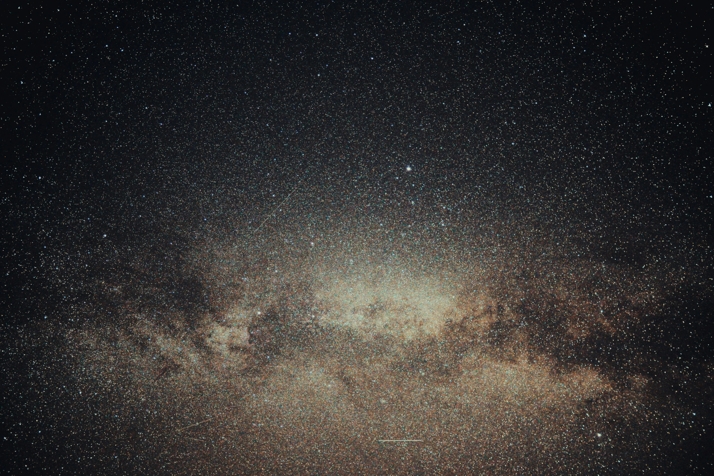 a very large amount of stars against the dark sky