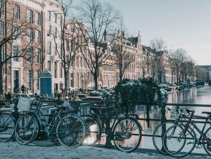 bicycles lined up on the side of a street