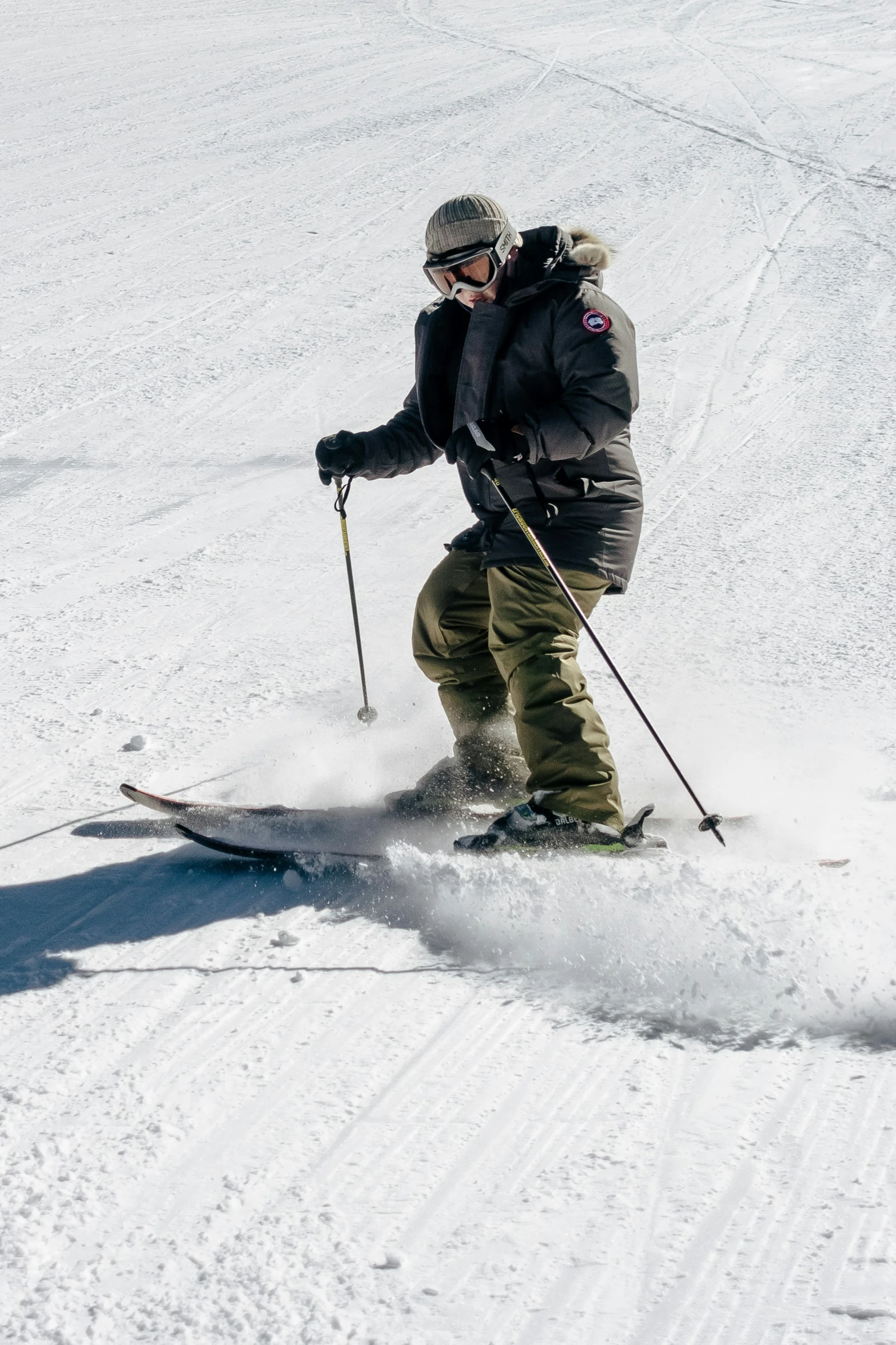 an image of a person skiing down a snowy hill