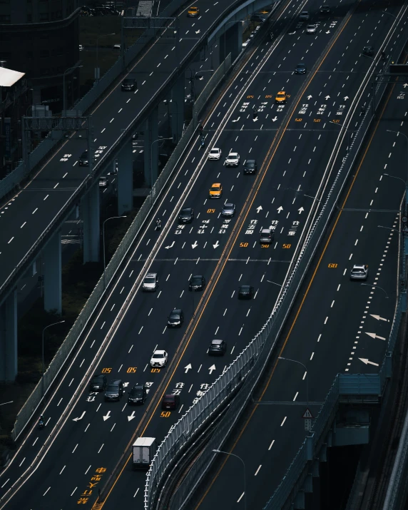 an aerial view of a freeway and highway at night