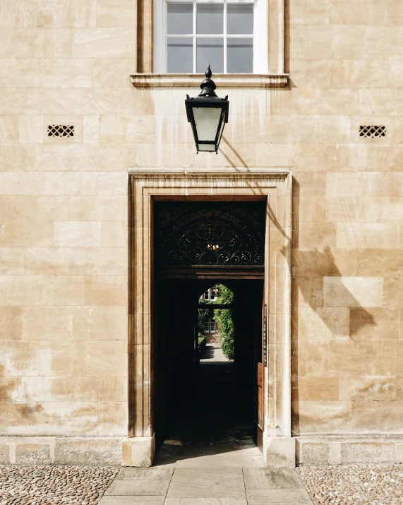 an entry way to the building and light