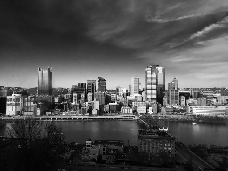 a city skyline and water with a sky line