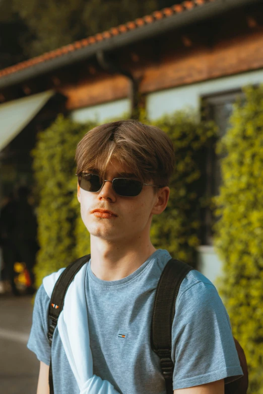 a man with a mustache wearing sunglasses