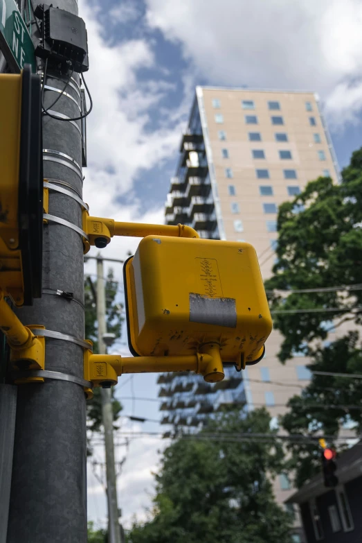 street sign with the word stop and light above