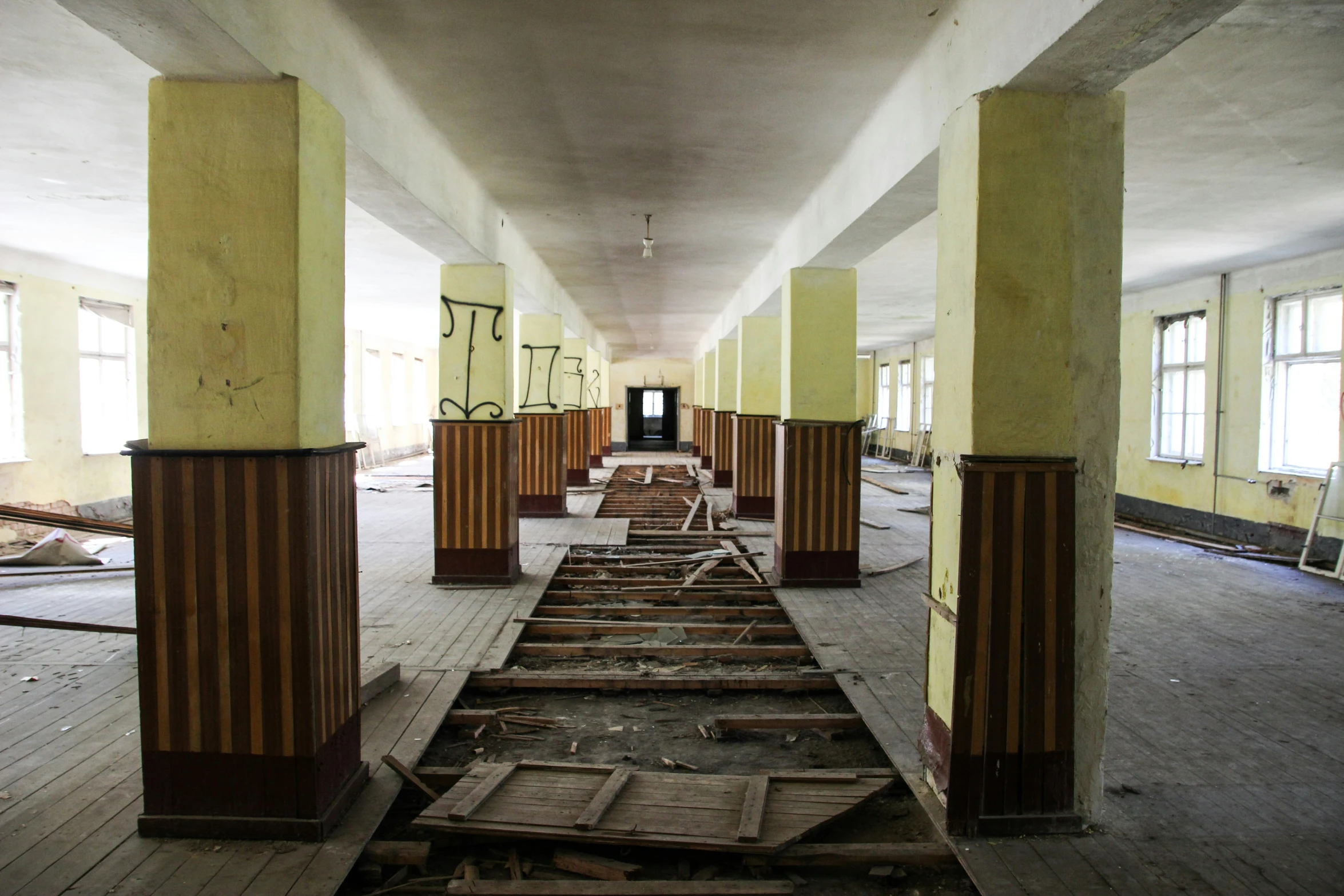 a hallway that is under construction in an old building