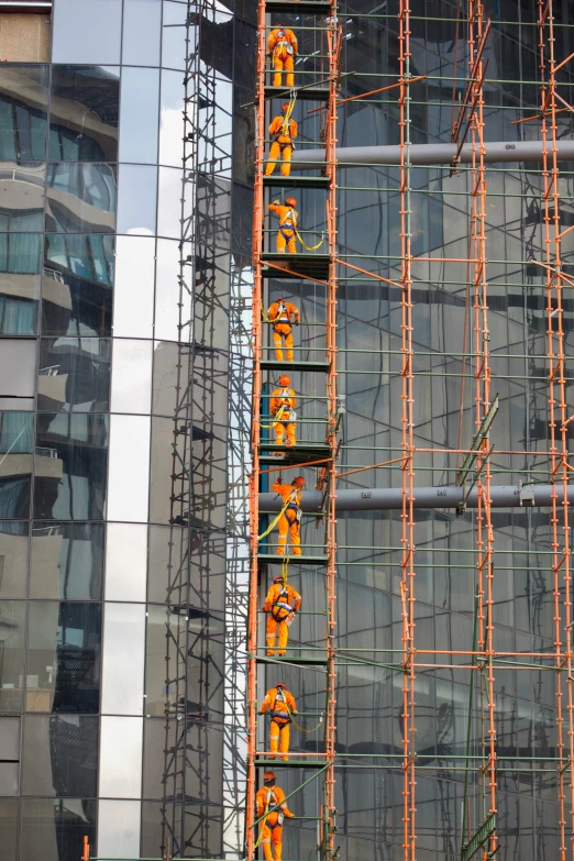 there are scaffolding in front of some buildings