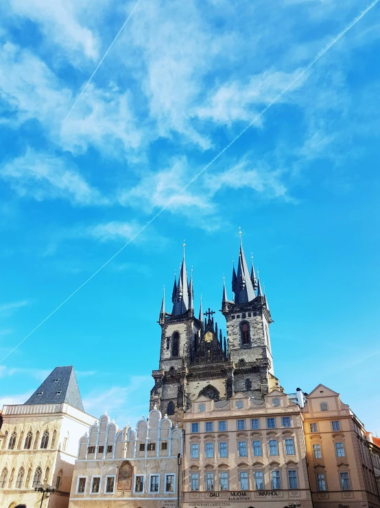 a castle that is next to some buildings