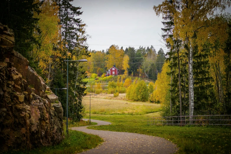 a view looking down the pathway on the side of a road