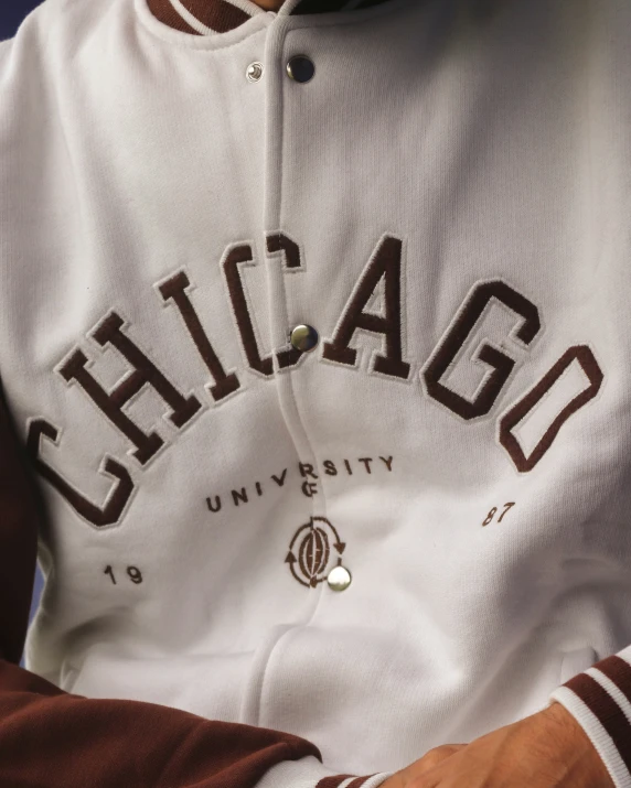 close up image of chicago baseball jacket and cap