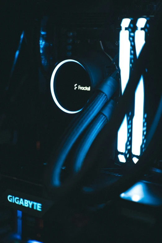 wires in front of a fan on a black table